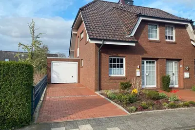 Image de Maison de vacances « Ferienhaus Grawe » avec terrasse privée, jardin partagé et Wi-Fi