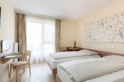 Image de Superior four-bed room - Jufa Hotel Stubenbergsee