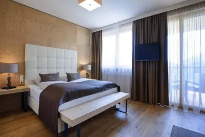 Image de Family room with balcony - Almwellness Hotel Pierer