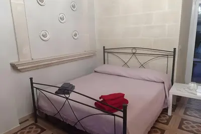 Image de Chambre quadruple confort B&B avec Wi-Fi et climatisation