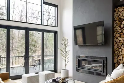 Image de Luxury 5br South Peak Loon Home - slopeside & riverside - hot tub - pets allowed