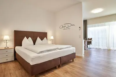 Image de Apartment with lake view and terrace/balcony - Haus am See