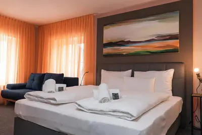 Image de Deluxe Suite for 4 persons - Kunsthotel Kirchenwirt Stubenberg