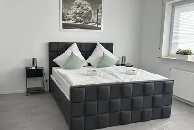 Image de Penthouse, KingSize Bed, Queen Size SofaBed, full Kitchen, 650 MBit, Workspace