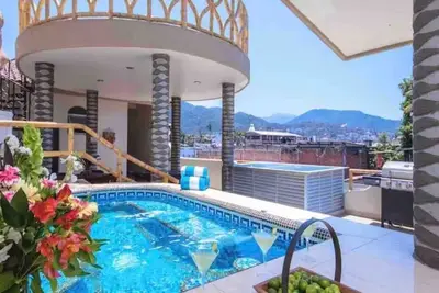 Image de Outstanding Value  Groups 7 king bed Full bath suites. Pool, Walk 2 Beach