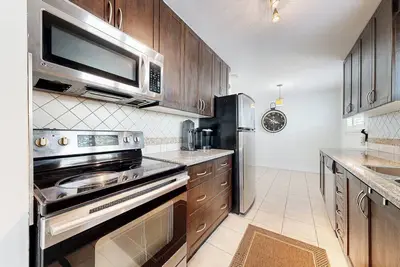 Image de Charming 2-bedroom house with Ac in vibrant Toronto