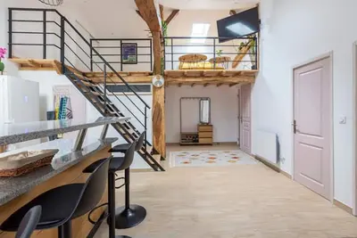 Image de Près du centre ville à 11 minutes de Center Parc. Mezzanine et jeux pour enfant.