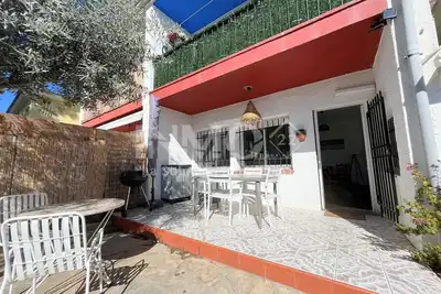 Image de Rez-de-chaussée avec patio et barbecue