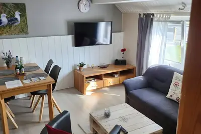 Image de Appartement « Möwennest » avec terrasse privée, jardin commun et Wi-Fi