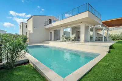 Image de Villa Luce – villa neuve et moderne avec piscine dans la soleilée Sardaigne