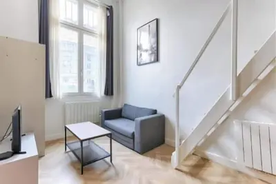 Image de Cosy Loft with Mezzanine in the Heart of Paris