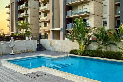 Image de spacious apartment w/ pool and garden view