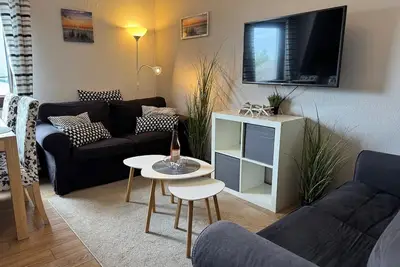 Image de Appartement 'Fewo Strandmuschel' avec jardin commun et Wi-Fi