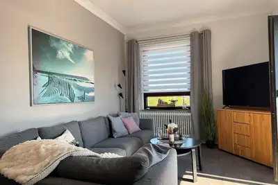 Image de Appartement 'Fewo Strandperle' avec jardin commun et Wi-Fi