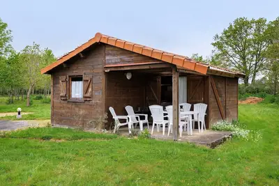 Image de Chalet « confort 12 » avec terrasse, piscine partagée