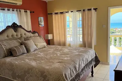 Image de Beautiful 10-bedroom villa with Ac in Treasure Beach, you can rent one or all!