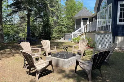 Image de Chalet au bord de l’eau avec Spa vue nature