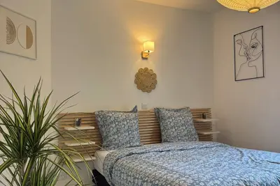 Image de Cosy 2 chambres - 10’Disney - Parking - Netflix