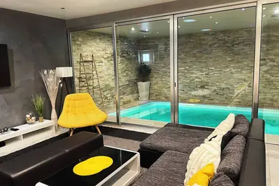 Image de Appartement standing piscine intérieur chauffée