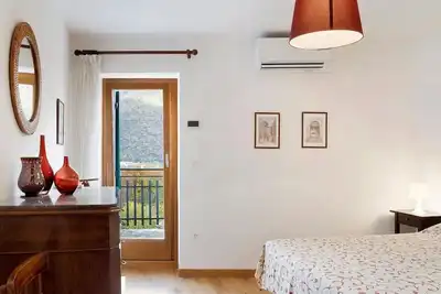 Image de Chambre « Unità 1 » avec vue sur le lac, Wi-Fi et climatisation