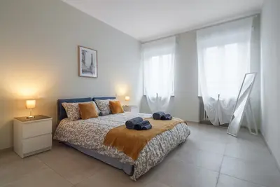 Image de Maison Rosaria : appartement moderne près de l’Allianz Stadium avec balcon