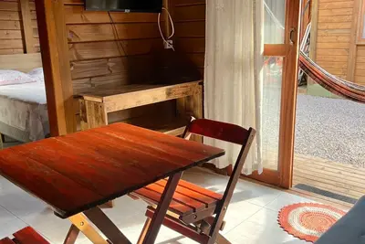 Image de Chalé Praia da Barra Confort et tranquillité à Praia do Rosa | Rose Mar Moradas