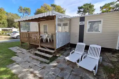 Image de Mobil-home « Mh 338 Ronce Les Bains » avec piscine partagée, terrasse privée et climatisation
