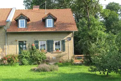 Image de Maison de vacances « Forsthaus Castell » avec vue sur la montagne, terrasse privée et Wi-Fi