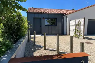 Image de Appartement 'Les Iris - Maison Chaleureuse' avec terrasse privée et Wi-Fi