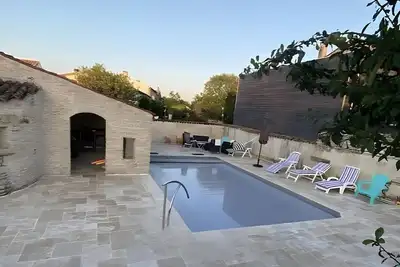 Image de Gîte Le Romarin : piscine partagée, terrasse commune et Wi-Fi à Courçon