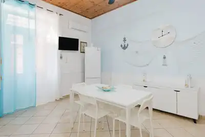 Image de Appartement « Perla Marina Piano Terra » avec Wi-Fi et climatisation