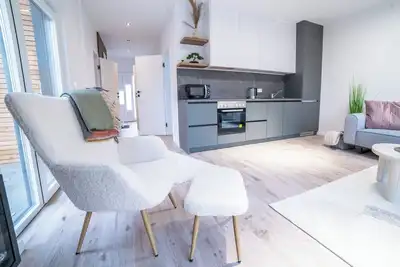 Image de House 1: 8 high-quality vacation homes with private sauna & jacuzzi on Sweet Lake