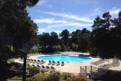 Image de Studio cabine proche golf et océan avec wifi et parking sécurisé