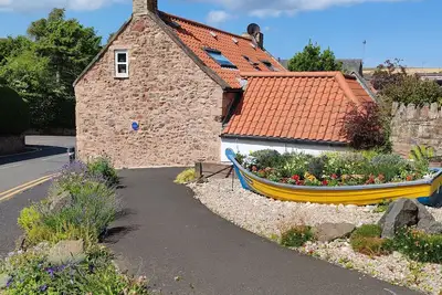 Image de Charming 1750s fisherman's cottage - pet friendly & 5 min from a stunning beach!