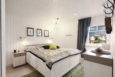 Image de Maison-Panoramique-Salle de bain privée-Vue sur la baie-eigener Bootssteg