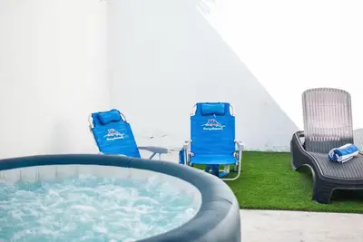 Image de Casita con jacuzzi privado a minutos de la playa