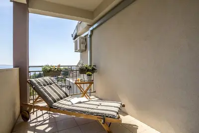 Image de Appartement de deux chambres avec la terrasse et la vue sur le mer Podstrana, Split (A-7539-a)