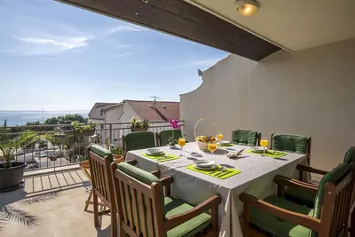 Image de Appartement d'une chambre avec la terrasse et la vue sur le mer Podstrana, Split (A-7539-b)