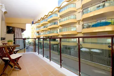 Image de Appartement moderne avec Wi-Fi et climatisation près de la plage, Première ligne, à quelques pas du