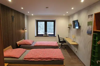 Image de Appartement « Unité 1 » avec vue sur la montagne, jardin privé et Wi-Fi