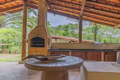 Image de Casa Rural em Ubatuba com Vista para Montanha