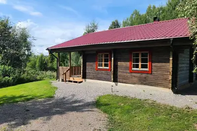 Image de Beautifully situated log cabin from 2025 with lake view