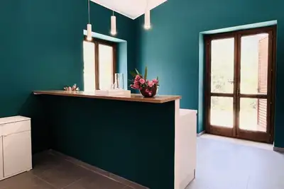 Image de Villa Bruca is a two-family house consisting of two separate units. The proposed unit, Villa Bruca 2, includes a double bedroom with the option of adding one single bed, a spacious bathroom with a modern walk-in shower, and a kitchen-living area equipped