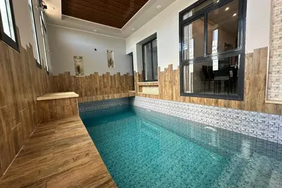 Image de Belgaïd – T4 haut standing, piscine intérieure chauffée uniquement aux familles