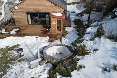 Image de Chalet Egat – Évasion Montagnarde avec Jacuzzi, Sauna et Vue Imprenable