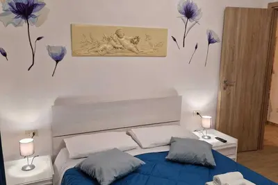 Image de At 5 minutes from the airport fiumicino/roma, single house 50 sqm, with garden.