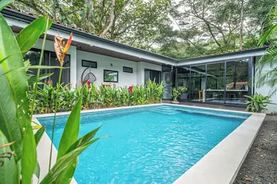 Image de Villa Puro Paraíso - calle a Punta Leona Piscina & Ac