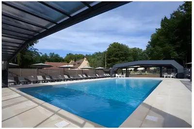 Image de Maison de vacances « Maison 4 Personnes » avec piscine partagée, Wi-Fi et climatisation