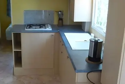 Image de Mobil-home « Dans Village de Gîtes » avec piscine partagée, Wi-Fi et climatisation