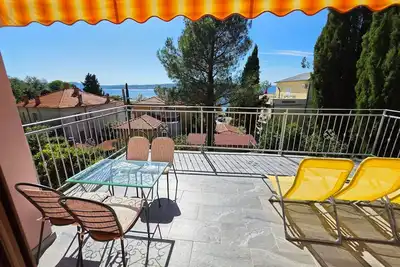 Image de Wohnung mit Terrasse, 150 m vom Sandstrand entfernt by Interhome